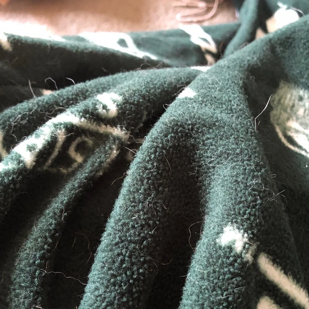 Cozy Dark Green Fleece Blanket with White Accent